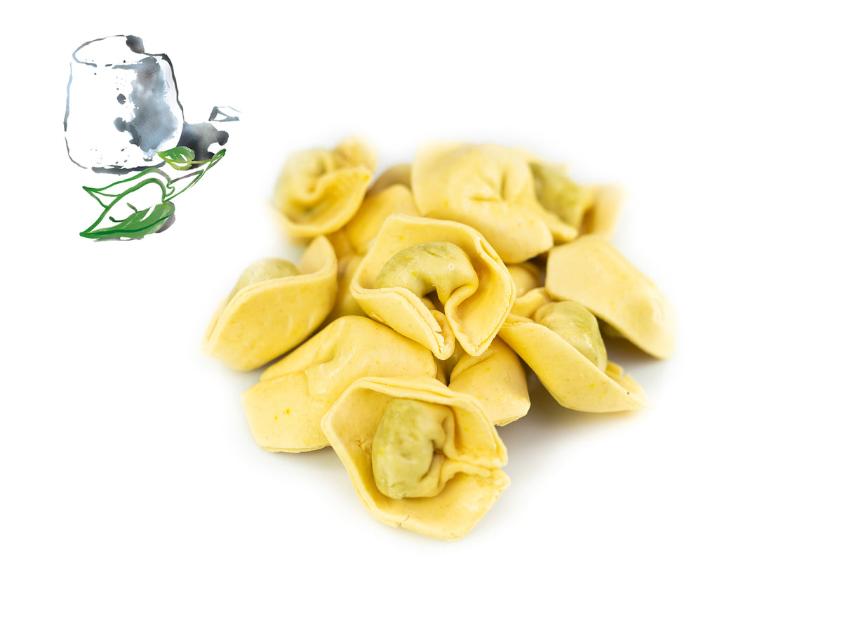 Tortelloni mit Ricotta & Spinat-Füllung angerichtet auf Teller